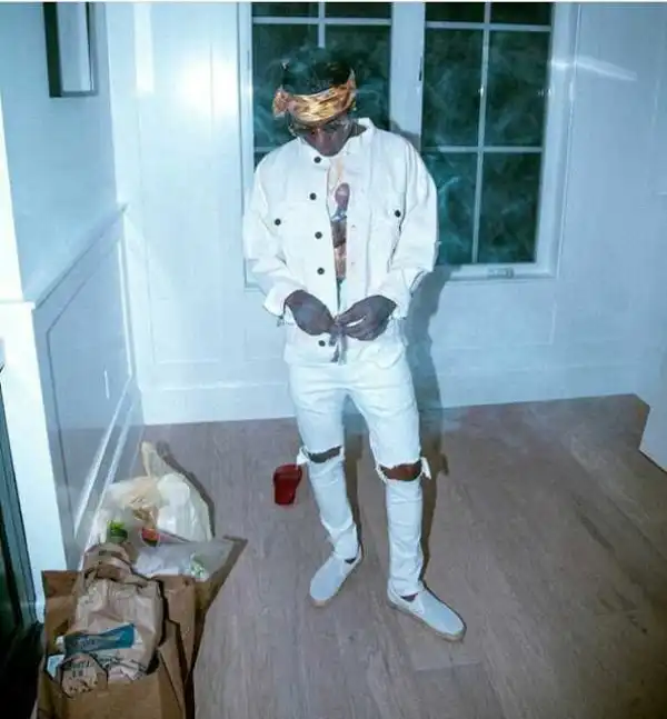"You Look Like A Mad Man": Fans Blast Wizkid For Smoking Hard In New Photo